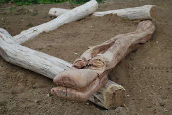 Sandkasten mit Krokodil